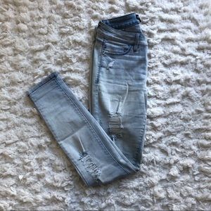 Bebe distressed light blue wash jeans, size 25